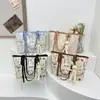 Bolso Tote para Mujer de Gran Capacidad Bolso de Hombro Sentido de Alta Gama Bolso Grande Transfronterizo Súper Caliente de Moda Nicho Graffiti Clase Bolso de Viaje