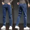 Pantalones vaqueros para hombre, de otoño e invierno, forrados de forro polar, gruesos, corte ajustado, pierna recta, elásticos, estilo 2008, modelo popular, pantalones vaqueros largos