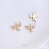 Serie de colgantes pequeños de circonita microincrustada retención de color oro 14K bolsa ojos de ángel palma cruz alas colgante