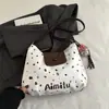 Bolsa de Mujer Linda de Dibujos Animados 2025 Nuevo Otoño e Invierno Retro Gran Capacidad Hombro Viajero Lunares Moderna Bolso Tote Versátil