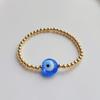 Amazon Europa y Estados Unidos personalidad popular ojo de diablo esmalte de color cuenta plana pulsera 18K cobre chapado en oro cuentas pulsera elástica mujer