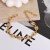 Collar minimalista de estilo ins europeo y americano popular con cadena de eslabones cosida con nariz de cerdo de acero de titanio chapado en oro de 18k E282-P270