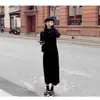 Falda de Punto Base Estilo Perezoso Otoño e Invierno 2025 Cuello Semitortuga Casual Longitud Media Elegante con Abrigo y Suéter Falda
