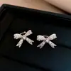 Pin de Clip para Oreja Exquisito Estilo Francés Súper Brillante con Corazón y Lazo de Zirconia para Mujeres Sin Perforaciones, Pendientes de Moda de Lujo Accesible