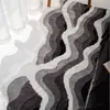 Alfombra flocado de patrón de onda irregular para uso doméstico, adecuada para dormitorios, vestidores, salas de estar y como alfombrilla para sofá o mirador.; es absorbente y engrosado para mayor comodidad