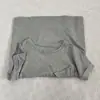 La tela se siente cómoda, bolsillo con vuelta, manga corta, manga integrada, nuevo de verano para mujer, cuello redondo, casual, suave, ceroso, camiseta