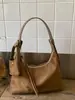 Bolsa de Mão Estilo Coreano Nicho Retrô para Dumpling Feminina Outono/Inverno 2026 Nova Veludo Versátil Casual Ombro Transversal