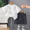 Conjunto de Verano para Niños 2026 Estilo Nuevo Ropa Delgada de Verano para Bebé Conjunto de Dos Piezas de Manga Corta con Cadena de Letras para Niños Venta al por Mayor