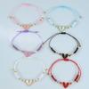 Explosiones transfronterizas Pulsera de aleación de corazón de moda europea y americana hombres y mujeres cuerda de mano tejida ajustable en stock venta al por mayor personalizado