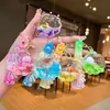 Llavero de concha marina rellena de aceite transfronteriza animal marino arena movediza concha de perla linda figura flotante colgante regalo pequeño