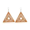 Moda europea y americana transfronteriza más vendida pendientes de madera geométricos exagerados personalidad huecos pendientes de madera marrón suministro directo de fábrica