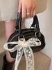 Bolso Boston portátil, sencillo, bonito y de alta gama, estilo coreano, estilo dulce, con relieve, informal, combinable, estilo occidental, para mujer.