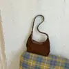 Bolsa de camurça para mulheres, nova coleção de outono da moda 2026, bolsa de ombro de alta qualidade para o dia a dia, bolsa de axila e bolsa transversal em uma paleta de cores Maillard