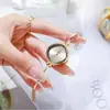 Nuevo reloj de cuarzo para mujer con esfera en forma de diamante, correa de acero tipo brazalete, estilo nicho de lujo ligero, versátil para el trabajo, reloj individual al por mayor