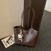 Bolsa Grande Capacidade Retrô Feminina 2026 Nova Outono Casual para o Dia a Dia Bolsa de Ombro Único Bolsa Tote Texturizada Simples Versátil