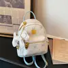Mochila de estilo lujo ligero con estampado de oso para mujer, mini mochila versátil coreana con un toque juvenil, adecuada para estudiantes y para ir al trabajo.