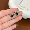 Brincos de Cristal Gradiente Preto Trevo de Quatro Folhas Joias de Orelha Brincos de Trevo de Quatro Folhas 2025 Novo Estilo Luxo Acessível Elegante e Sensação de Alto Padrão