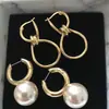 [18] Pendientes de perlas estilo palacio retro simple europeo y americano pendientes de concha geométrica estilo socialité elegante