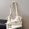 Bolso de hombro nuevo estilo coreano Shuai Mi Jia para mujer, bolso de axila de moda nicho de gran capacidad, bolso tote texturizado para el día a día