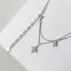 Collar con Colgante de Estrella para Mujer 2025 Nuevo Lujo Accesible Diseño de Nicho Incrustado de Diamantes Estrella de Seis Puntas Cadena de Clavícula de Gama Alta para Mujer