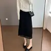 Elegancia estilo francés, bordado elaborado, corte recto favorecedor, cintura elástica, bajo con abertura, falda blanca y negra para mujer