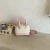 Nova Bolsa Rosa de Concha para Mulheres Primavera 2026, Bolsa de Ombro de Nicho Estilo Coreano de Luxo Leve, Bolsa Transversal Versátil para o Dia a Dia