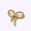 [56] broche de lazo moda coreana cara retorcida retorcida broche en forma de corazón accesorios de alta gama para ropa bolsa