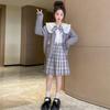 Traje JK estilo universitario para niñas 2023 Primavera y Otoño Nuevo estilo británico falda plisada tejido Princesa infantil traje de tres piezas