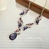 Collar Colgante Gota de Agua Morado Oscuro de Lujo Ligero Estilo Palacio con Pendientes de Botón Versátiles Retro de Gama Alta de Nicho Frescos y Modernos