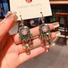 Indústria pesada coreana leve luxo high-end cristal verde longo borla brincos femininos elegante rosto fino orelha gotas na moda