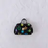 Creativo estilo pequeño fragante PU pequeño bolso llavero borla monedero portátil mini auriculares bolso pequeño colgante al por mayor