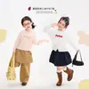 Ropa Infantil Nuomi Wanzi 2026 Otoño Versión Coreana Algodón Peinado Camiseta Básica para Niñas Camiseta de Punto de Manga Larga de Algodón Puro para Niños