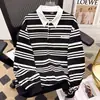 Polos de manga larga a rayas blancas y negras para hombre y mujer, nuevos estilos de otoño, con cuello camisero, adecuados para parejas, sudaderas casuales y prendas de abrigo de corte holgado