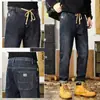 Jeans elásticos para hombre de otoño e invierno, pantalones largos con cordón, pantalones rectos elásticos de microcorte cónico, pantalones de moda para hombre
