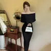 Nuevo vestido de punto de un hombro para mujer transfronterizo con cuello de solapa, mangas largas, corte ajustado y una falda larga de estilo francés