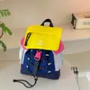 Mochila com cordão color-blocking moderna estilo japonês para meninos e meninas, mochila casual de grande capacidade para viagens para alunos do ensino fundamental