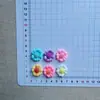 Novos acessórios coloridos doces de resina de cor sólida em formato de pétala atacado DIY grampo de franja cola de creme chaveiro tamancos