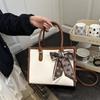 Bolsa de mão com estampa de cores da moda feminina, primavera e verão 2025, nova bolsa tote para deslocamento, estilo ocidental, bolsa transversal feminina