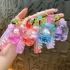 Nuevo llavero de biberón transfronterizo, exquisito colgante de arena líquida, accesorio de llavero para bolso, pequeño regalo, venta al por mayor de comercio exterior