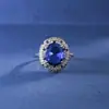 Anillo de Zafiro de Cristal Afilado de Simulación para Mujer Lujo Completo Diamante Anillo Abierto Tendencia de Moda Anillo de Tesoro de Color Transfronterizo Europeo y Americano para Mujer