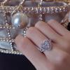 Nuevo lujo luz lujo temperamento grupo engastado efecto quilate gran amor imitación anillo de diamantes Mosan aretes de corazón con diamantes completos