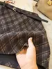 Falda corta de lana a cuadros retro petite para mujer, nueva de otoño, de cintura alta, adelgazante, línea A, anti-exposición, bodycon