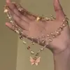 Colar de Borboleta Empilhada com Franjas Estilo Livro Vermelho Pequeno Feminino Princess Escape Luxo Leve Elegante Corrente para Clavícula de Alto Valor