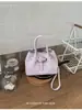 Nueva bolsa de axila de lunares 2026 verano nuevo bolso de mano moda casual bolso pequeño bolsa de albóndiga