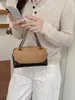 Bolsa Redonda Cilíndrica Retro Melanoid para Mano Mujer Otoño 2026 Nueva Patchwork de Gamuza Bolsa Almohada Cadena Bolso de Hombro Único Cruzado