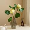 Simulación de alta gama Flor Emperador flocado tamaño pequeño Flor Emperador Lan decoración de mesa de comedor de hotel accesorios de arreglo floral flor artificial al por mayor