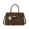Bolso de mano de lujo ligero de nicho para comercio exterior para mujer, nuevo, estilo retro para el trabajo, para el día a día, de un solo hombro, cruzado