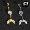 Nuevo colgante de ombligo estilo europeo y americano con forma de cola de pez, anillo de ombligo de titanio G23, joyería de ombligo chapada en oro real de 18k, directo del fabricante