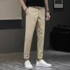 Pantalones casuales cortos para hombre, corte slim, corte recto, verano 2026, delgados, elásticos, color liso, largos