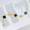 Joyas chapadas en oro de la misma tienda: Pulsera de trébol de cuatro hojas de cinco flores con incrustaciones de ágata negra para mujer, pulsera de trébol de la suerte, moderna y versátil
